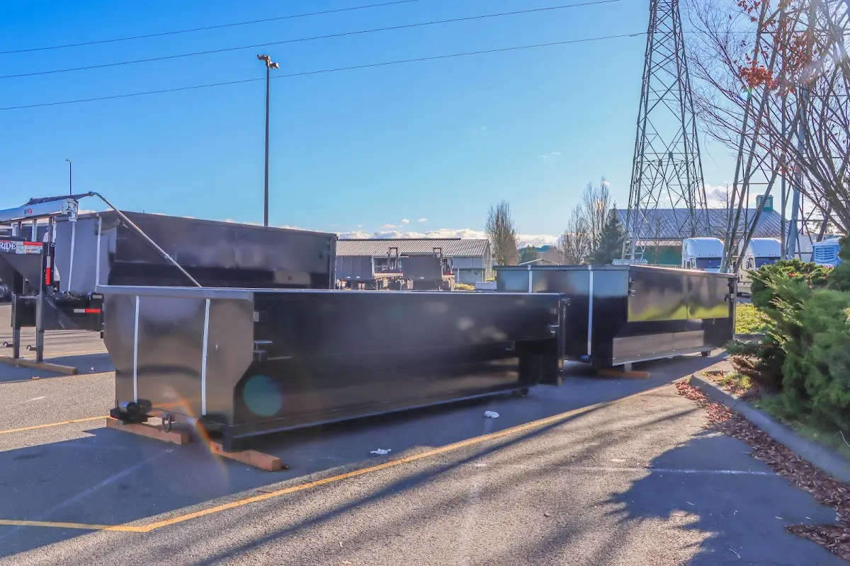 Roll-off dumpster ready for waste disposal at job site for Concrete Dumpster Rental in Concord